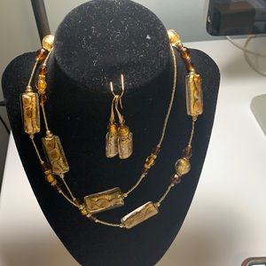 Marano glass necklace and earrings with gold inlays.